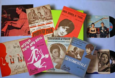 08. Vista parziale di una teca contenente disci e spartiti degli anni '60 08. Vista parziale di una teca contenente disci e spartiti degli anni '60